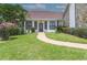 Inviting home exterior with walkway and landscaping at 2228 Sylvan Ct, Kissimmee, FL 34746