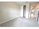 Spacious bedroom with a large closet and carpet flooring at 7924 Spectrum Dr, Kissimmee, FL 34747