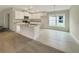 Bright kitchen boasts an island, granite countertops, and ample cabinet space at 4197 Sagefield Dr, Harmony, FL 34773