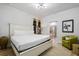 Relaxing main bedroom with plush bedding and ensuite bathroom at 8869 Rhodes St, Kissimmee, FL 34747