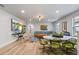 Fun playroom with sectional sofa, game table and alphabet rug at 8869 Rhodes St, Kissimmee, FL 34747