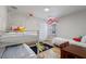 Fun ' bedroom with bunk beds, playful decor, and a Pokemon-themed rug at 8869 Rhodes St, Kissimmee, FL 34747
