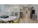 Game room with pool table, dartboard and refrigerator at 8869 Rhodes St, Kissimmee, FL 34747
