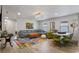 Spacious playroom with sectional sofa and game table at 8869 Rhodes St, Kissimmee, FL 34747