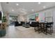 Bright and airy living room with comfortable seating and large artwork at 8869 Rhodes St, Kissimmee, FL 34747