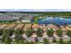 Aerial view showcasing a townhome with a small yard at 8869 Rhodes St, Kissimmee, FL 34747