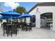 Outdoor bar and lounge area with seating at 8869 Rhodes St, Kissimmee, FL 34747