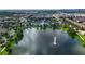 Lake with fountain in the center of the community at 8869 Rhodes St, Kissimmee, FL 34747