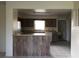 Bright kitchen with wood cabinets and an island at 1106 N Hoagland Blvd, Kissimmee, FL 34741