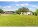 Large backyard with a view of another house at 4092 Gay Nell Ct, Orlando, FL 32811