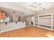 Kitchen with light wood cabinets, granite countertops, and stainless steel appliances at 2807 Strand Loop Ct, Oviedo, FL 32765