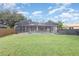 Large backyard with a screened pool and spa at 2807 Strand Loop Ct, Oviedo, FL 32765
