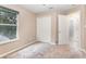 Bright bedroom with carpet flooring, double door closet and access to a hallway at 2807 Strand Loop Ct, Oviedo, FL 32765