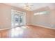 Gathering room with sliding glass doors leading to the backyard at 2807 Strand Loop Ct, Oviedo, FL 32765