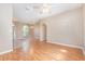 Spacious living room with laminate wood floors and an archway at 2807 Strand Loop Ct, Oviedo, FL 32765
