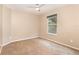Bright bedroom with neutral walls, carpet, and a window at 2807 Strand Loop Ct, Oviedo, FL 32765