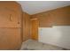Workshop with pegboard walls and storage at 16 Cypress Dr, Eustis, FL 32726
