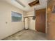 Workshop with pegboard walls and water heater at 16 Cypress Dr, Eustis, FL 32726