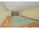 Spacious living room with hardwood floors and sliding doors at 16 Cypress Dr, Eustis, FL 32726