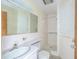 Small bathroom with shower, toilet and sink at 16 Cypress Dr, Eustis, FL 32726