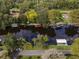 Waterfront homes with private docks and lush landscaping at 16 Cypress Dr, Eustis, FL 32726