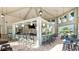 Relaxing community bar with seating and a large countertop at 4751 Clock Tower Dr # 105, Kissimmee, FL 34746