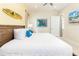 Main bedroom with king-size bed and ensuite bathroom access at 3074 Key Lime Loop, Kissimmee, FL 34747
