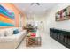 Living room with open concept floor plan and adjacent dining area at 3074 Key Lime Loop, Kissimmee, FL 34747