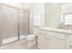 Bathroom with walk-in shower, toilet, and vanity at 3074 Key Lime Loop, Kissimmee, FL 34747