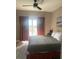 Main bedroom with king-size bed and balcony access at 13427 Blue Heron Beach Dr # 501, Orlando, FL 32821