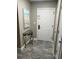 Bright entryway with tile floors and decorative table at 13427 Blue Heron Beach Dr # 501, Orlando, FL 32821
