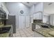 Kitchen with stainless steel appliances and granite counters at 4732 Park Eden Cir, Orlando, FL 32810