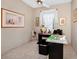 Home office with a desk, chair, and ample natural light at 250 White Marsh Cir, Orlando, FL 32824