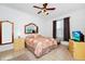 Bright bedroom with tiled floors and ceiling fan at 250 White Marsh Cir, Orlando, FL 32824