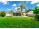 Large backyard with screened porch at 250 White Marsh Cir, Orlando, FL 32824