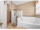 Bathroom with soaking tub and shower at 250 White Marsh Cir, Orlando, FL 32824
