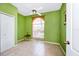 Bedroom with green walls, tiled floors, and ceiling fan at 250 White Marsh Cir, Orlando, FL 32824
