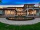 Stunning pool and patio area with a beautiful fountain feature at 25602 Grandview Pointe, Sorrento, FL 32776