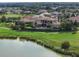 Luxury estate home on a golf course with a lake view in a upscale community at 25602 Grandview Pointe, Sorrento, FL 32776