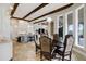 Gourmet kitchen with island, exposed beams, and breakfast nook at 25602 Grandview Pointe, Sorrento, FL 32776