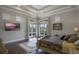 Bright main bedroom with hardwood floors and stunning views at 25602 Grandview Pointe, Sorrento, FL 32776