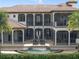 Luxury home with pool and fountain, expansive patio, and Mediterranean style at 25602 Grandview Pointe, Sorrento, FL 32776