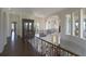 Grand hallway showcasing high ceilings, hardwood floors, and ornate details at 25602 Grandview Pointe, Sorrento, FL 32776