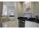 Bathroom with a built-in bar and black countertops at 25602 Grandview Pointe, Sorrento, FL 32776