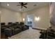Home theater with comfortable recliner seating and large screen at 25602 Grandview Pointe, Sorrento, FL 32776