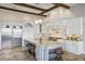 Spacious kitchen with granite island, stainless steel appliances, and ample cabinetry at 25602 Grandview Pointe, Sorrento, FL 32776
