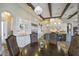Gourmet kitchen boasts granite counters, stainless steel appliances, and custom cabinetry at 25602 Grandview Pointe, Sorrento, FL 32776