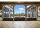 Tranquil courtyard with fountain and lush landscaping, accessible through the house at 25602 Grandview Pointe, Sorrento, FL 32776
