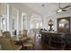 Breakfast area with round table and chairs near a large window at 25602 Grandview Pointe, Sorrento, FL 32776