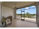 Spacious lanai with seating area and stunning views of the golf course and lake at 25602 Grandview Pointe, Sorrento, FL 32776